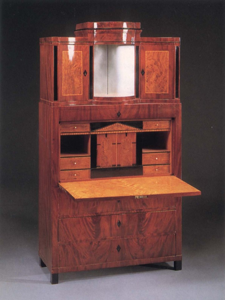 19th Century AUSTRIAN, Biedermeier Mahogany, Fruitwood and Burl Walnut Fall-Front Secretaire, 1820-1825
Mixed woods, 76 3/8 x 42 1/8 x 18 3/4 in. (194 x 107 x 47.6 cm)
The superstructure is fitted with a mirrored niche and flanked by two incurved cupboard doors surmounted by a stepped cornice above one frieze drawer and the fall-front opening to a fitted architectural interior centered by
BIE-001-FU
Appraisal Value: $0.00
User2: $0.00
User3: $0.00