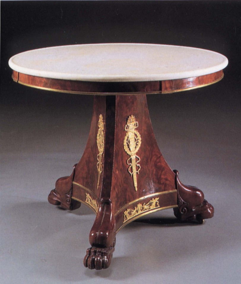 19th Century FRENCH, Late Empire Ormolu-Mounted Mahogany Center Table, 1810-1815
Mahogany, 30 x 38 1/8 x 38 1/4 in. (76.2 x 96.8 x 97.2 cm)
Circular white mottled marble top above the plain frieze fitted with later brass border raised on a canted tripartite support fitted with ormolu flaming torches within a laurel wreath on paw feet.
FRE-003-FU
Appraisal Value: $0.00
User2: $0.00
User3: $0.00